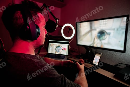 Preview: a gamer playing and streaming live with microphones and cameras