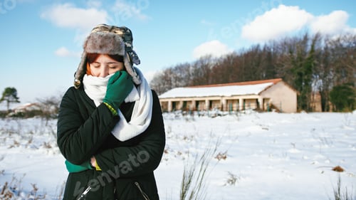 Preview: woman covers her face with scarf