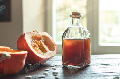 Preview: Pumpkin Still Life with Glass Bottle on Wood