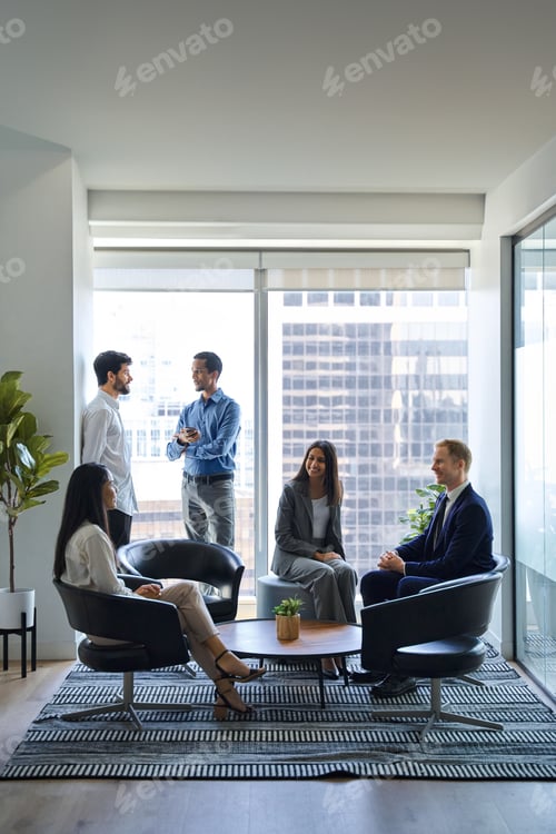 Preview: Busy professional team business people talking in office lobby. Vertical shot