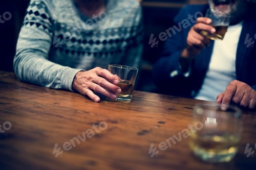 Preview: Two friends having a drink together