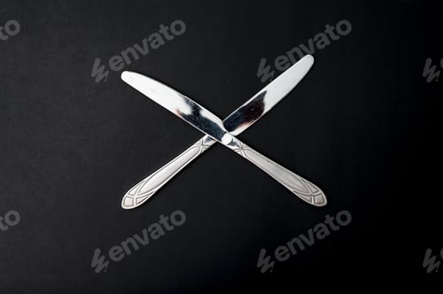 Preview: Top view of the table knives on a black background