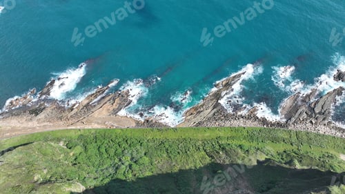 Preview: Aerial view of rocky seashore on a sunny day