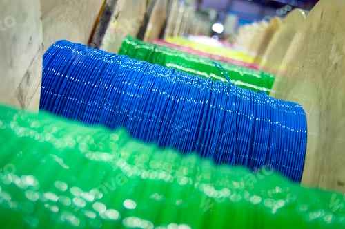 Preview: Group of fiber optic cable reels with intertwined optical fibers