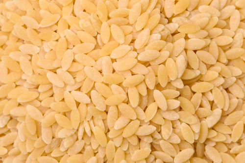 Preview: Raw whole grain orzo pasta as an ingredient for a delicious dish