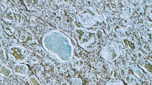 Preview: Top-down view to the textures and patterns of the cracked sea-ice formations