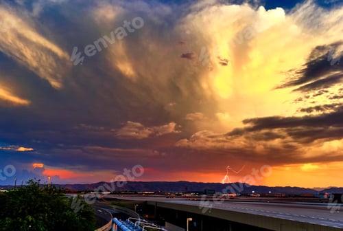 Preview: A small Thunderstorm moves into the Phoenix Metro at sunset.