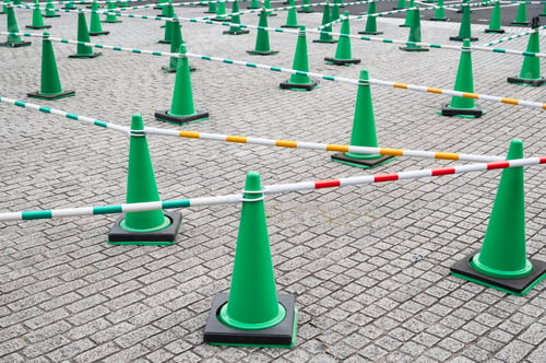 Preview: Green Traffic Cones with Barricades Forming a Queuing System