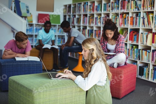 Preview: Attentive students studying in library