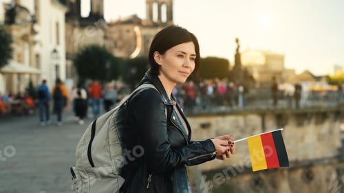 Preview: Young Woman Holds German Flag In Hand