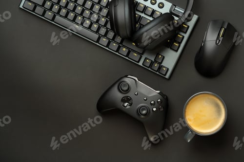 Preview: Gaming concept on black background with computer keyboard and joystick