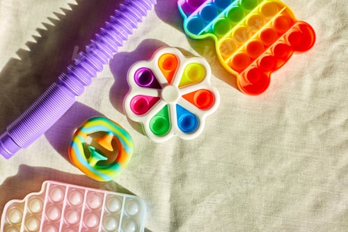 Preview: Top view of trend colorful push pop it bubble sensory fidget toys of different shapes