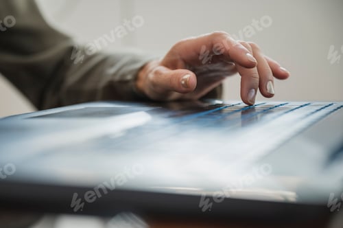 Preview: Female hand typing on laptop computer keyboard