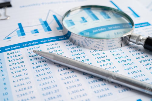 Preview: Magnifying glass on charts graphs paper. Financial development, Banking Account, Statistics