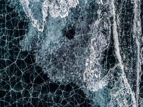 Preview: Ice with cracks in Lake Baikal in winter. Aerial view. Siberia, Russia.