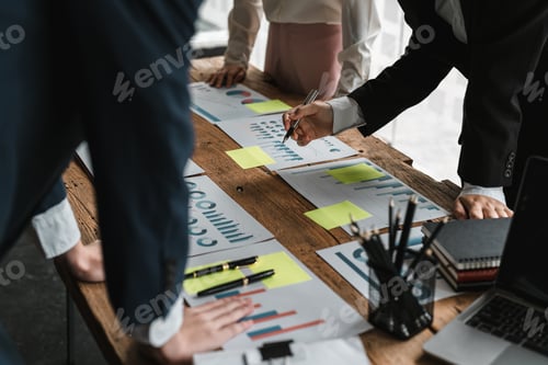 Preview: businessman and businesswoman talking discussion in group meeting at office table in a modern