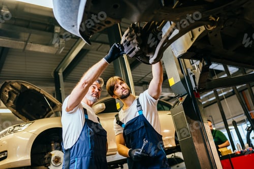 Preview: Wheel bearings change the mechanics of car service concepts in automobile center showrooms.