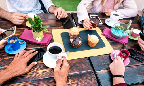 Preview: Top angle view of people with phones at coffee shop restaurant