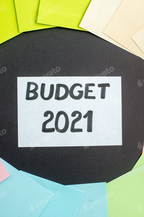 Preview: top view budget note around different colorful stickers on dark background color college student