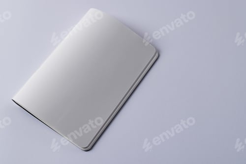Preview: Close up of white notebook with copy space on white background