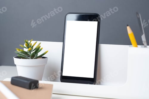 Preview: modern office stationery on white table and dark grey wall