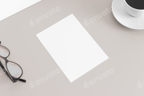 Preview: White invitation card mockup with workspace accessories. 5x7 ratio, similar to A6, A5.