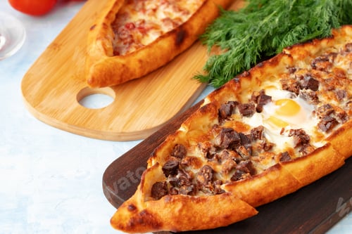 Preview: Close up of Turkish Pide bread on wooden table