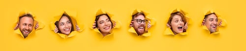 Vista previa: Amazed men and women peeking out from holes