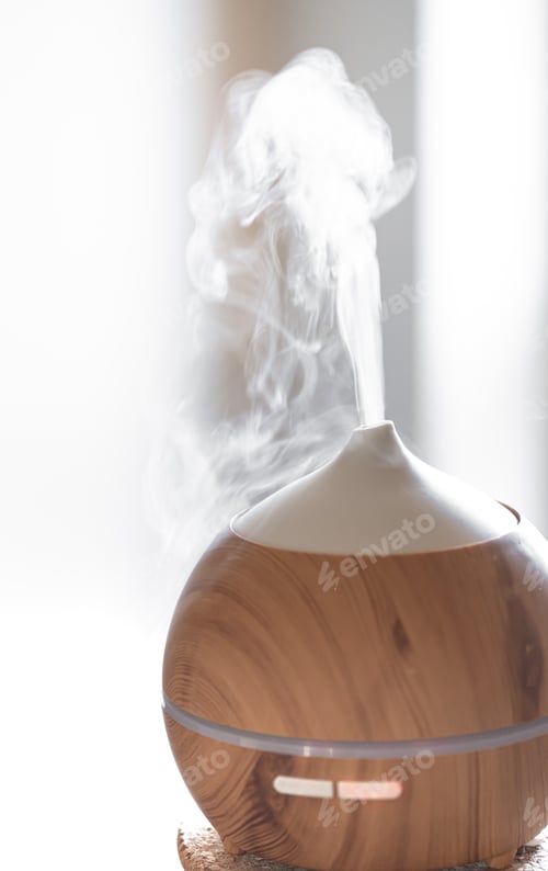 Preview: Modern oil aroma diffuser close up on a blurred background.