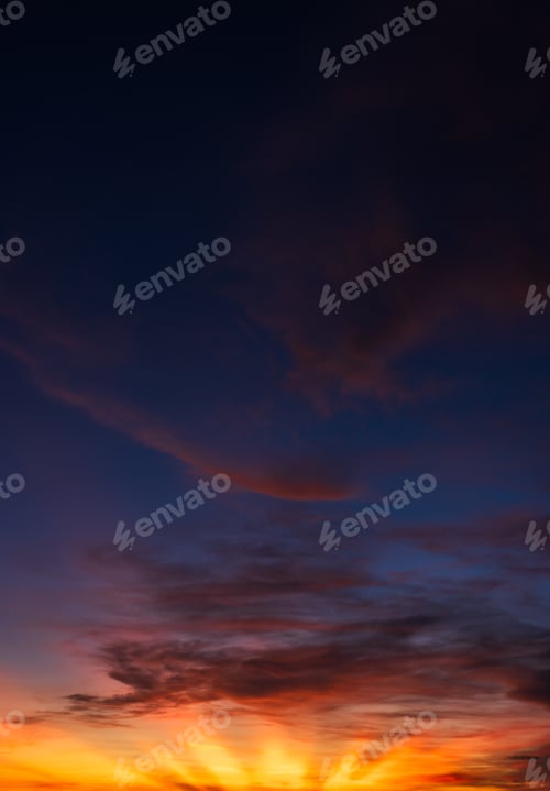 Preview: Evening sky Vertical, Sunset sky clouds with orange,yellow sunlight on Dark Blue dusk sky background