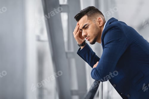 Preview: Portrait Of Pensive Middle Eastern Man Standing Near Window At Airport Terminal
