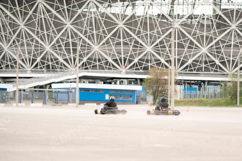 Preview: two pilots drive karting and and take part in race, pro competition