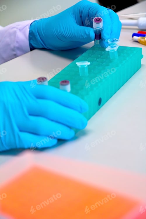 Preview: Scientist holding a test tube in a research lab