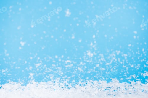 Preview: White Snowflakes on Light Blue Winter Background