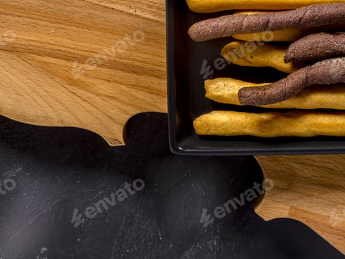 Preview: Grissini italian crunchy bread sticks lay flat isolated on studio.