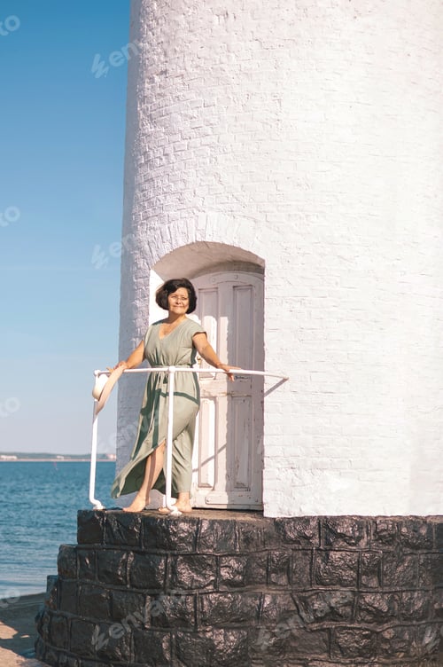 Preview: Woman in lighthouse in blurred background