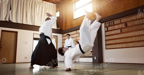 Preview: Aikido dojo with sensei, wooden sword and student training for fitness, fight and action in gym. Te