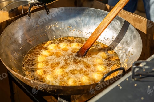 Preview: Delicious Asian street food market with takeaway meals, preparing sweet rice balls