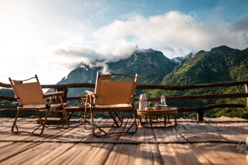 Preview: Chairs on the balcony and mountain view