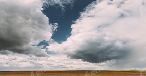 Preview: Countryside Rural Field Landscape With Empty Brown Soil. Early Spring Agricultural Season