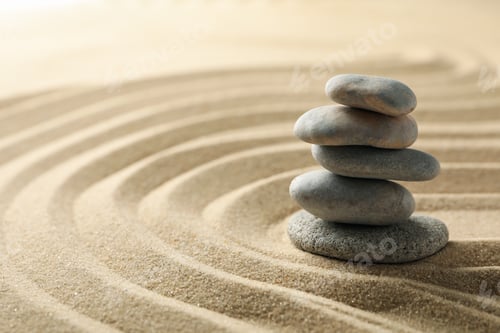 Preview: Stones on the sand with patterns. Zen concept