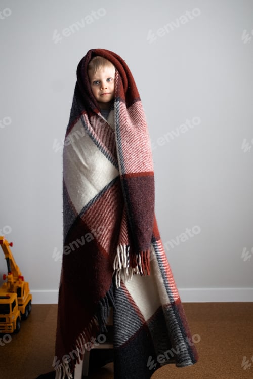 Preview: boy wrapped himself in a huge blanket