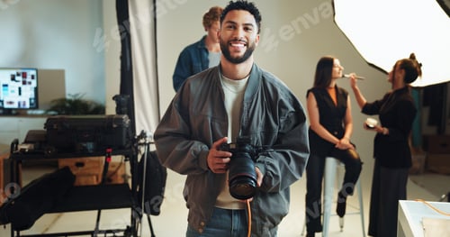 Preview: Camera, portrait and smile with photographer in studio for start of catalog or magazine photoshoot.