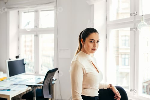 Preview: Portrait of worker standing in office