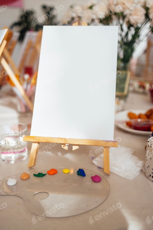 Preview: A blank canvas awaits creativity, artist palette with vibrant colors