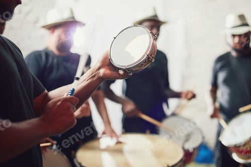 Preview: These are the beats of Brazil. Closeup shot of a musical performer playing drums with his band.