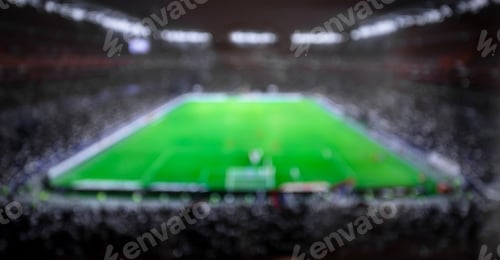 Preview: Blurry football stadium full of spectators.