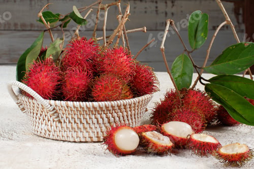 Preview: Fresh and ripe rambutan sweet tropical fruit on white background