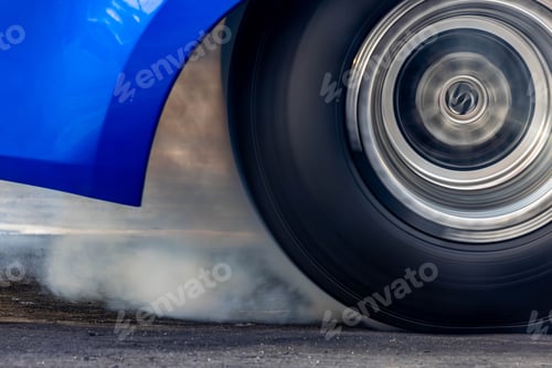 Preview: Car burnout wheels tire with white smoke,Car wheel burnout with smoke from the spinning tyre.