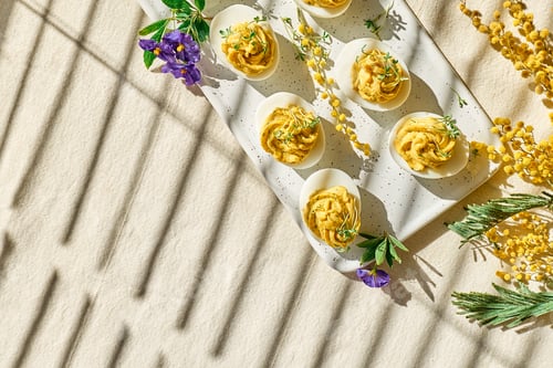 Preview: Stuffed easter eggs mimosa with egg yolk, turmeric, cream cheese and cress salad.